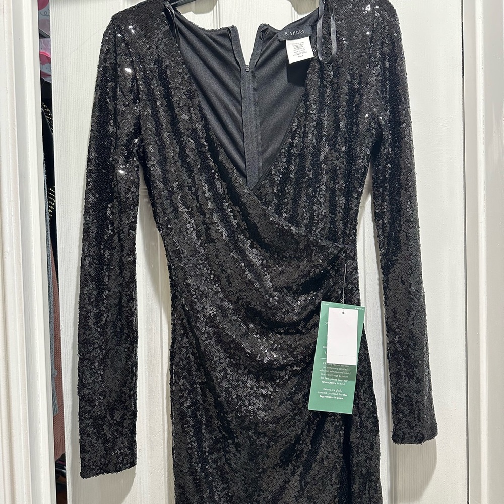 Black long sleeve sequin body con dress.